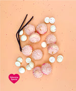 Pink Vanilla Macaroons Dipped in White Chocolate